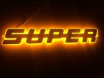 Διακοσμητική Πινακίδα 3D LED "SUPER" 24V Πορτοκαλί Φως 400mm x 70mm για Scania S / R / P / G / L